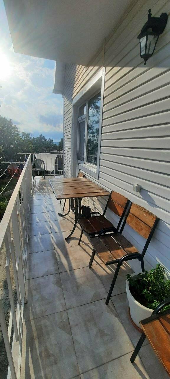 Фотографии номера Четырехместный номер с видом на море в Гостевом доме Дубовая Роща Туапсе